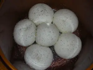 Rolls sprinkled with herbs and ready to bake in the crockpot. Image by Aprille Ross